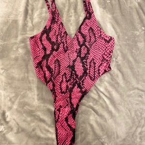 Fashion Nova pink and black snake skin body suit